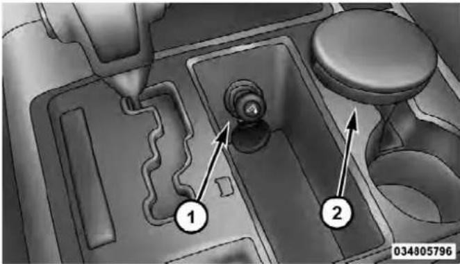 Technical diagram of a mechanical component with numbered parts and directional arrows indicating assembly or flow.