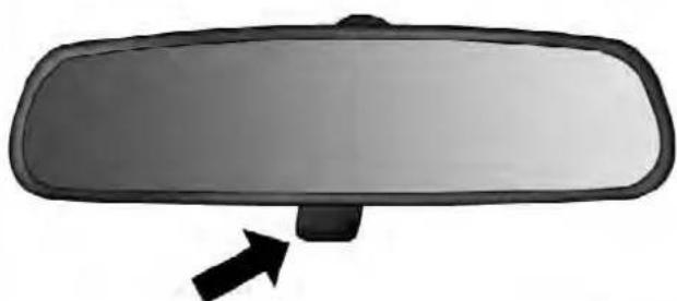 Front view of a car rear mirror with an arrow pointing to the side (no text or symbols)
