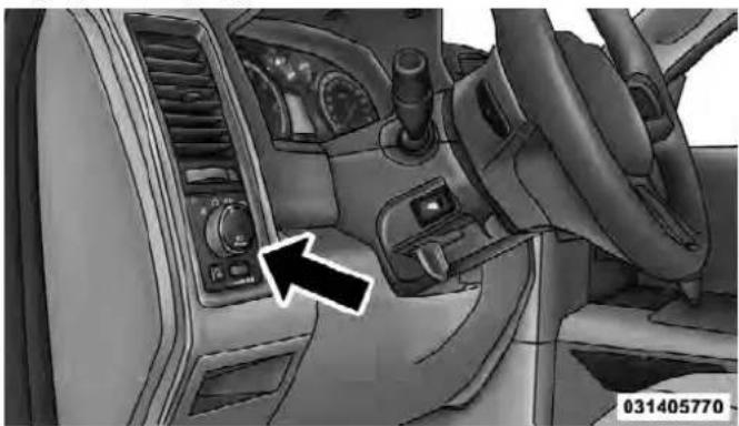 Interior view of a car dashboard and steering wheel (no visible text or symbols)