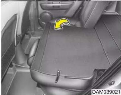 KIA Soul (2012) - To fold down the rear seatback: - 2