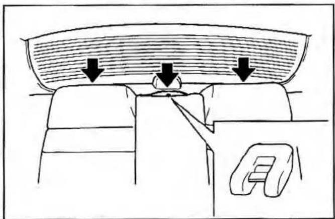 Diagram of a car interior showing seat, dashboard, and overhead canopy with arrows indicating airflow or movement (no text or symbols)