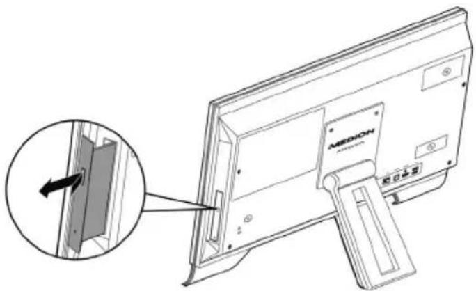 Technical diagram showing a device with an attached panel and a magnified inset highlighting the component's direction.