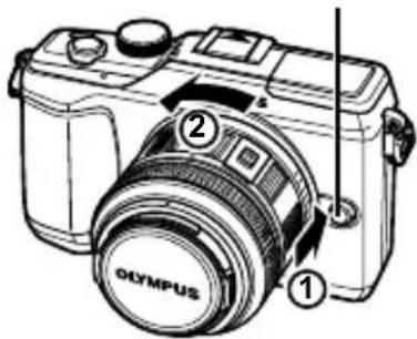 OLYMPUS PEN E-PL2 - Removing the lens from the camera - 2