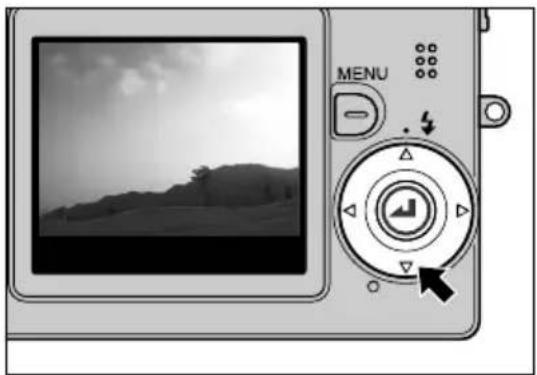 Digital camera interface showing a blank landscape image and control panel (no text or symbols on the device itself)