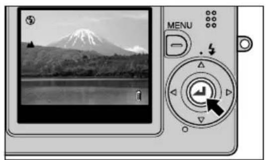 Digital camera interface showing a landscape photo with Mount Fuji and a lake, no visible text or symbols on the device itself.