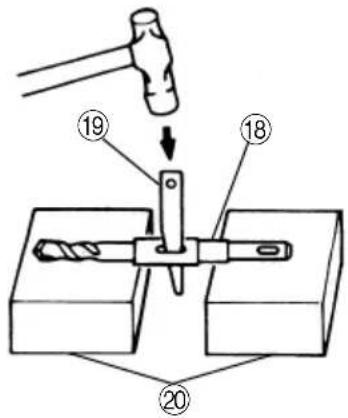 Diagram illustrating a hammer tool application on a drill bit, labeled with parts 18 and 20.