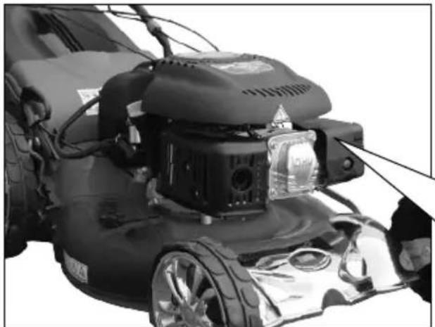 Close-up of a lawn mower with visible headlight and wheels (no text or symbols)