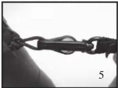 Close-up of a rope knot securing a person's arm, labeled with number 5 (no text or symbols on the knot itself)
