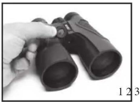 Hand holding binoculars with no visible text or symbols on the devices