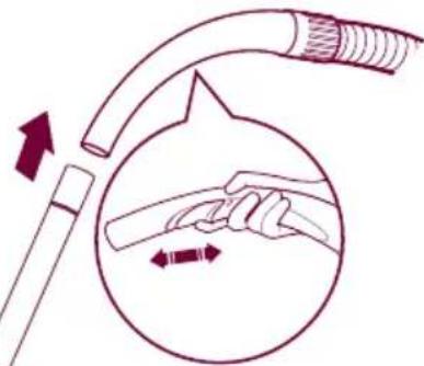 Diagram showing a hand holding a tool inside a circular device with directional arrows indicating movement (no text or symbols)