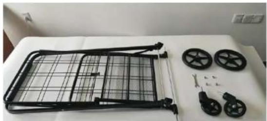 Black plastic carabiner with grid frame and four wheels on a white surface (no text or symbols visible)