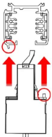 Technical diagram showing mechanical assembly with red arrows indicating upward motion or force directions