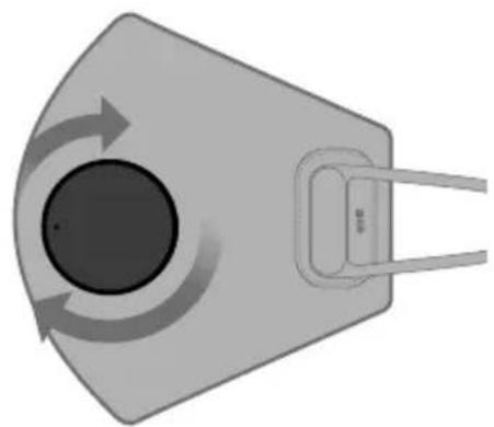 Diagram of a device with circular component and directional arrows indicating rotation or flow (no text or symbols)