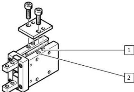 Technical diagram of a mechanical assembly with labeled parts 1 and 2