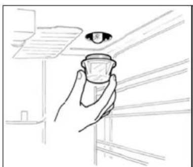 Line drawing of a hand holding a small object above a window, with an eye above the wall (no text or symbols)