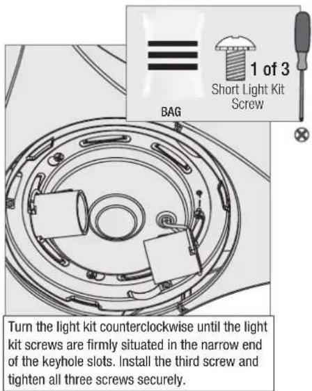 1 of 3 Short Light Kit Screw BAG Turn the light kit counterclockwise until the light kit screws are firmly situated in the narrow end of the keyhole slots. Install the third screw and tighten all three screws securely.