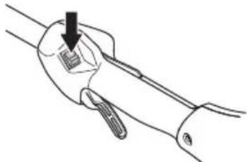 Line drawing of a hand holding a tool with a black arrow pointing to the handle (no text or symbols)