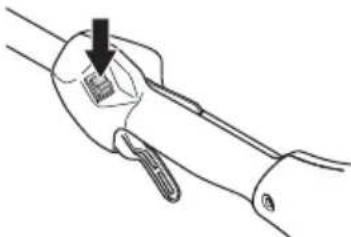 Line drawing of a hand holding a tool with a black arrow pointing to a component (no text or symbols)