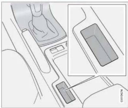 VOLVO C70 (2009) - Compartiment de rangement derrière le frein de stationnement - 1