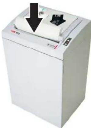 White paper printer with a black arrow pointing downward, showing the paper's edge and internal structure (no text or symbols visible)