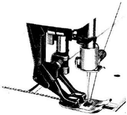 Illustration technique d'une aiguille de machine à coudre et de son support (sans texte ni symboles visibles)