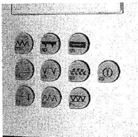 Image recadrée montrant une grille d'icônes circulaires avec des symboles et des chiffres, représentant peut-être une collection ou une disposition.