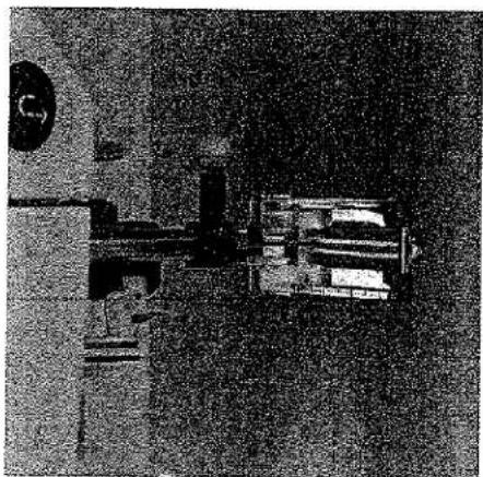 Photo en noir et blanc d'un assemblage mécanique ou d'un ensemble sans texte ni symboles visibles.