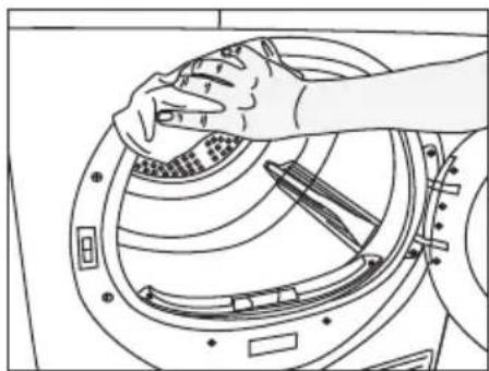 Line drawing of hands cleaning a circular mechanical component (no text or symbols)