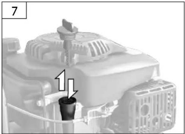 Close-up of a mechanical component with a black cylindrical component inserted, showing internal structure and a numbered label '7' (no readable text or symbols beyond the number)