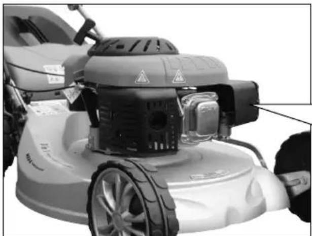Close-up of a lawn mower with visible tire, blade, and head (no text or symbols)