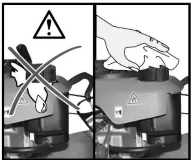 Safety warning illustration showing hazard symbols on a device with a hand holding a valve, indicating hazard or hazard.