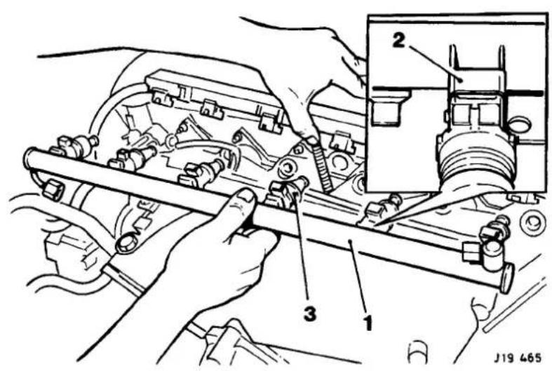 Technical diagram showing mechanical assembly with labeled parts and an inset view of a component detail
