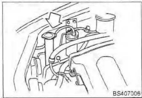 Technical line drawing of a vehicle engine bay with hoses and valves (no text or symbols)