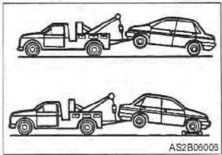 Line drawings of two car tow tractors, one pulling a sedan and the other pulling a car (no text or symbols)