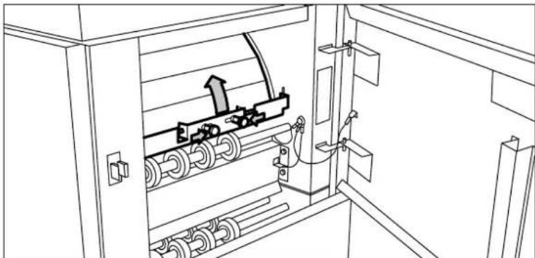 Line drawing of an electrical cabinet interior with rollers and a directional arrow indicating motion (no text or symbols)