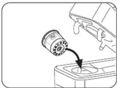Diagram showing a mechanical component with a gear-like component inserted into a base, no text or symbols present