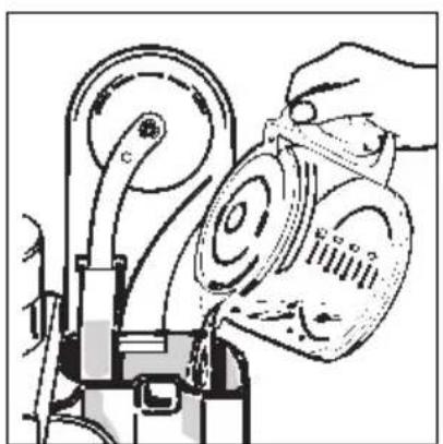 Illustration of a hand pouring liquid into a mechanical pump (no text or symbols visible)