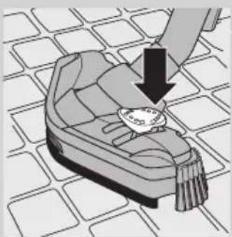 Illustration of a hand placing down on a patterned off-white surface with a small object on the ground.
