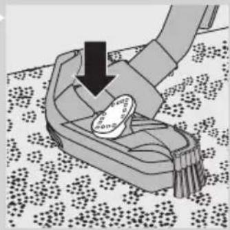 Illustration of a hand pressing down on a small object with a downward arrow, placed on a patterned surface.