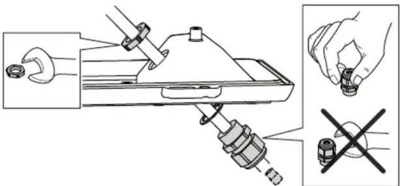 Technical diagram showing mechanical assembly with wrench, clamp, and valve components, including a close-up of a valve mechanism with no visible text or symbols.