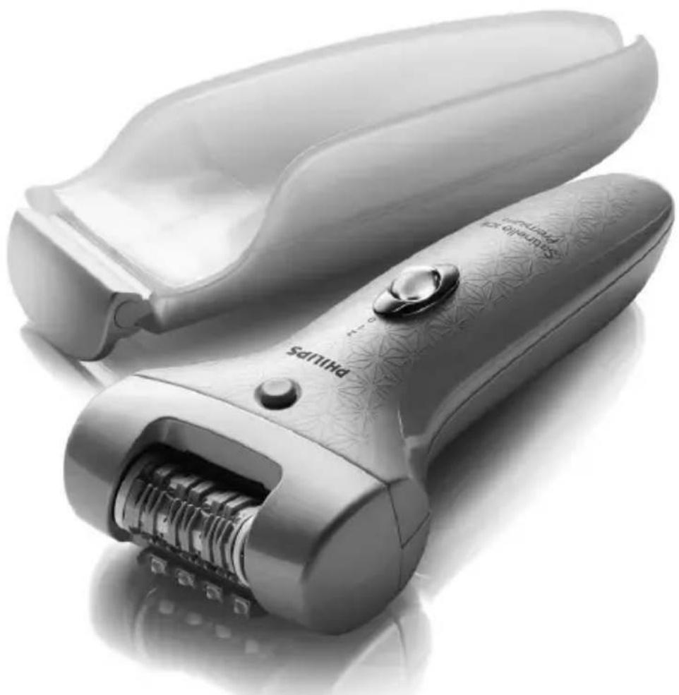 Close-up of a Philips electric shaver with a textured grip and metallic blade (no visible text or symbols)