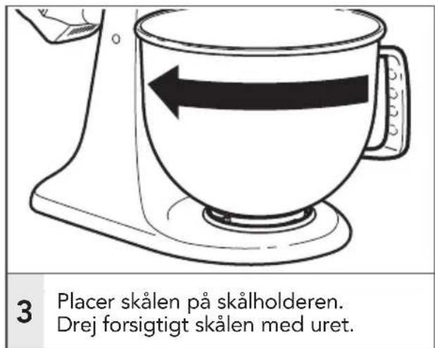 3 Placer skålen på skålholderen. Drej forsigtigt skålen med uret.