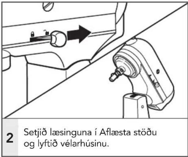 2 Setjið læsinguna í Aflæsta stöðu og lyftið vélarhúsinu.