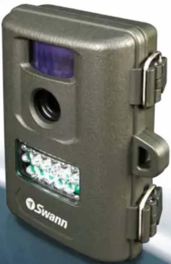 Exterior view of a Swann camera device with lens and green LED display (no text or symbols on body)