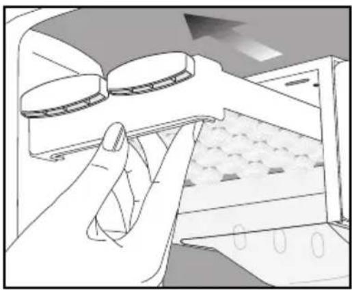Illustration of a hand using a tool to clean or store items, with no visible text or symbols.