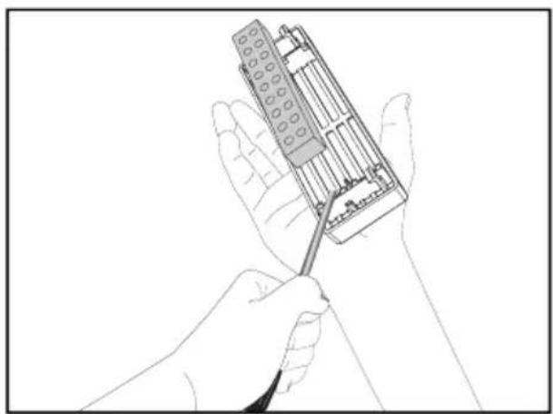 Line drawing of hands using a handheld tool to adjust or install a mechanical component (no text or symbols visible)
