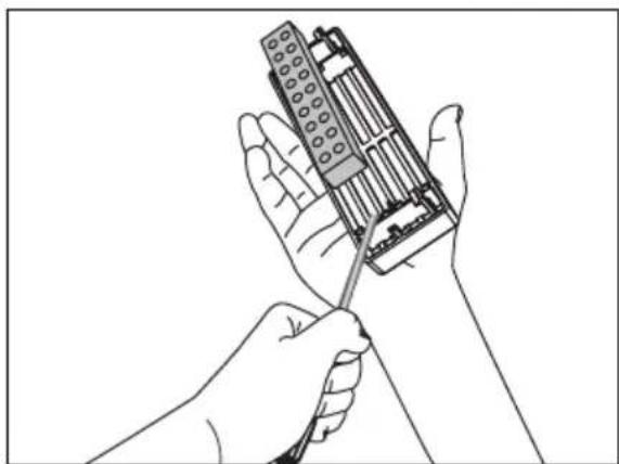 Line drawing of two hands using a handheld device to adjust or install a mechanical component.