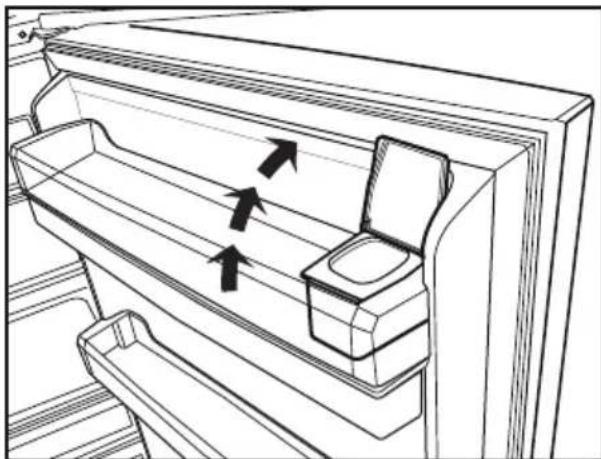 Line drawing of a refrigerator interior showing door, drawer, and toilet with directional arrows indicating airflow or movement (no text or symbols).