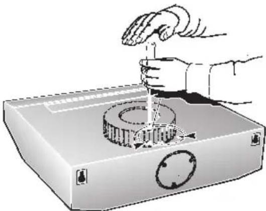 Illustration of a hand using a tool to press or install a mechanical component, no text or symbols present