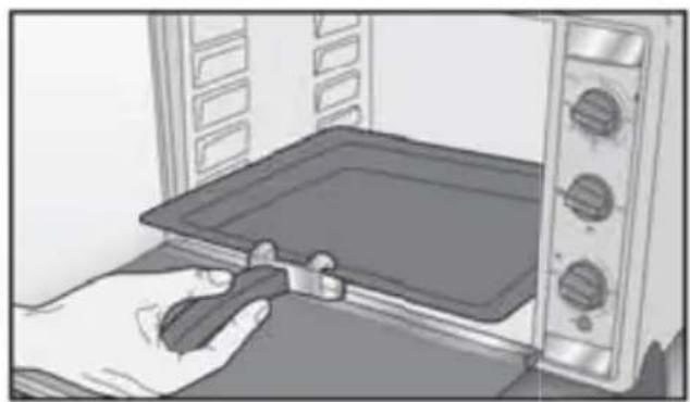 Illustration of a hand using a tool to clean or operate a microwave oven (no text or symbols visible)